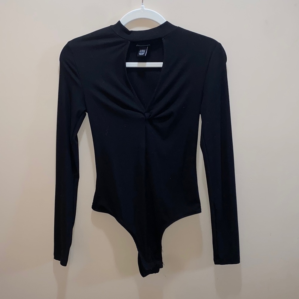 Black bodysuit with neck cutout